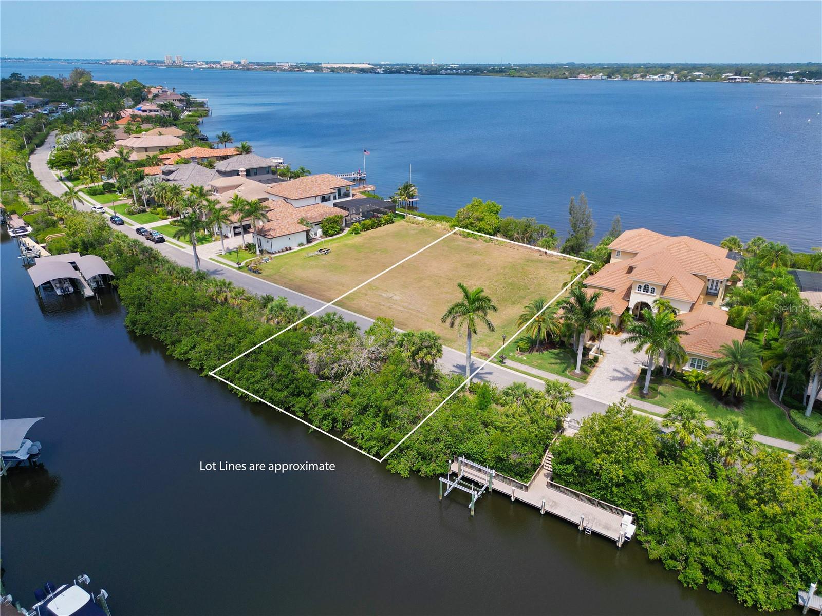 Dreams do come true... take a look at this spectacular lot in the exclusive gated community of Hawk Island off of the Gulf Coast of Southwest Florida, on the south side of the Manatee River with direct access to the Gulf of Mexico. This lot offers 100.3' of direct riverfront with unobstructed views along with 111' frontage to a deep water salt water canal that can accommodate boats up to 70'... this property is a water lover's dream with magnificent water views to enjoy each day of the year along with breathtaking sunsets each evening. You can build your viewing dock to watch the magnificent views of the beautiful wildlife and boats on the Manatee River as well as your boating dock on the canal side of the property where you can store your boat and your other water toys. You are only a short boat ride to the beautiful water of the Gulf of Mexico that is lined with soft powdery white sandy beaches. This property is ideally located near Sarasota, downtown Bradenton, Lakewood Ranch, St. Petersburg, Tampa, three airports, shopping, fine dining restaurants, arts and theatres, internationally known IMG Sports Academy and 3 major hospitals. You also have the options of so many outdoor activities... year round fishing, golfing, hiking and even mountain biking close by. This is your dream lot where you can build your spacious ranch style home or your luxurious 2 story home. Architectural drawings for a home with specifications according to Manatee County and the coastal line are available upon request. Let this creation be yours...come see, come sigh and make this exclusive river to canal property on beautiful Hawk Island your own.