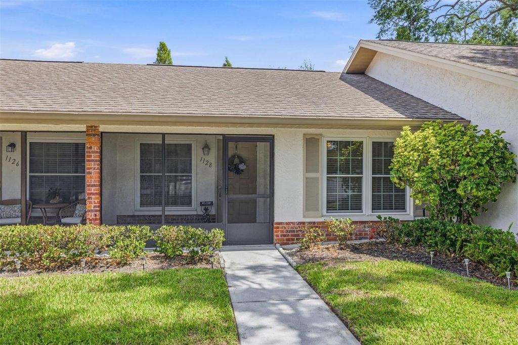 Photo of 1128 Tarridon Court, Dunedin, FL 34698 (MLS # TB8510402)