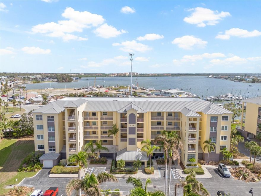 This luxury 3-bedroom, 2-bathroom condo in Madeira Beach has been beautifully remodeled and is now available for rent. Located just half a mile from the beach, restaurants, and shops, this condo features a convenient split-bedroom layout with a primary bedroom and ensuite separate from the other two bedrooms and guest bathroom. The upgraded kitchen boasts stone countertops and opens to the dining and living areas. Step through the sliding glass doors to the oversized balcony for a lovely view of Boca Ciega Bay. Plantation shutters throughout the home add an elegant touch to this waterfront property. You'll also have access to a 1-car private garage with epoxy floors on the ground level of the building. This second-floor end-unit condo can be accessed via stairs or an elevator for your convenience. Upon entering, you'll find a private indoor laundry room. The Snug Harbour condo community is pet-friendly, allowing dogs up to 75 pounds. Community amenities include a clubhouse, heated pool and spa, boat docks, gated lobby, and a car wash station. Residents can also rent boat slips within the community. The monthly condo fee covers cable TV, water, trash, and sewer. The condo association just replaced the roof, and recent upgrades include a new HVAC system (2024), a tankless water heater (2023), and insulated, impact sliding glass doors (2023). Condo furnishings are available for purchase separately. This condo is spacious enough to be your primary residence, a vacation home, or a rental investment. Start enjoying the picturesque Gulf of Mexico beaches—schedule your showing today!