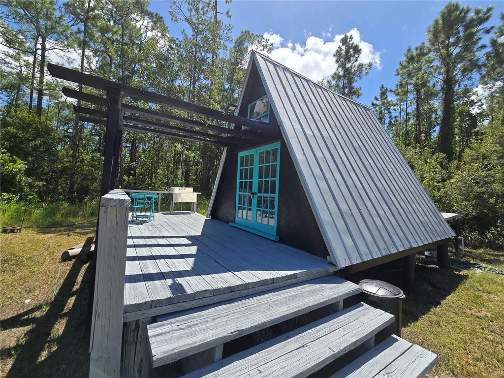 Photo of 19041 State Road 60 E, Lake Wales, FL 33898 (MLS # TB8436129)