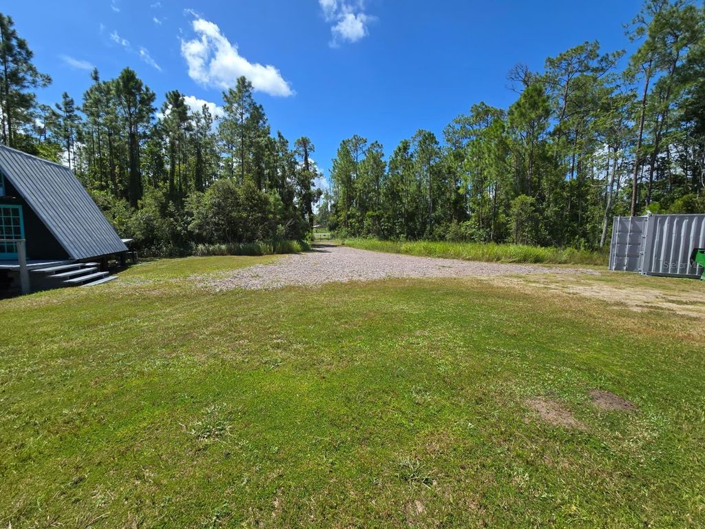 Photo of 19041 State Road 60 E, Lake Wales, FL 33898 (MLS # TB8436129)