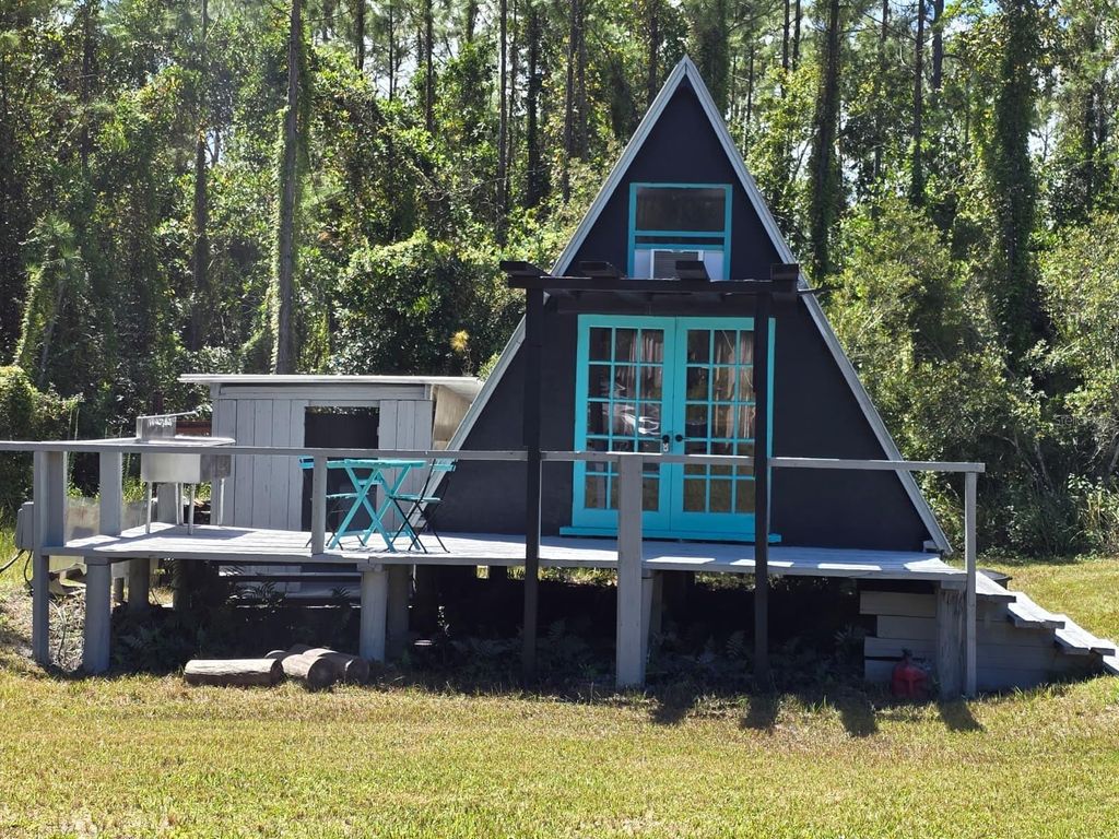 Photo of 19041 State Road 60 E, Lake Wales, FL 33898 (MLS # TB8436129)