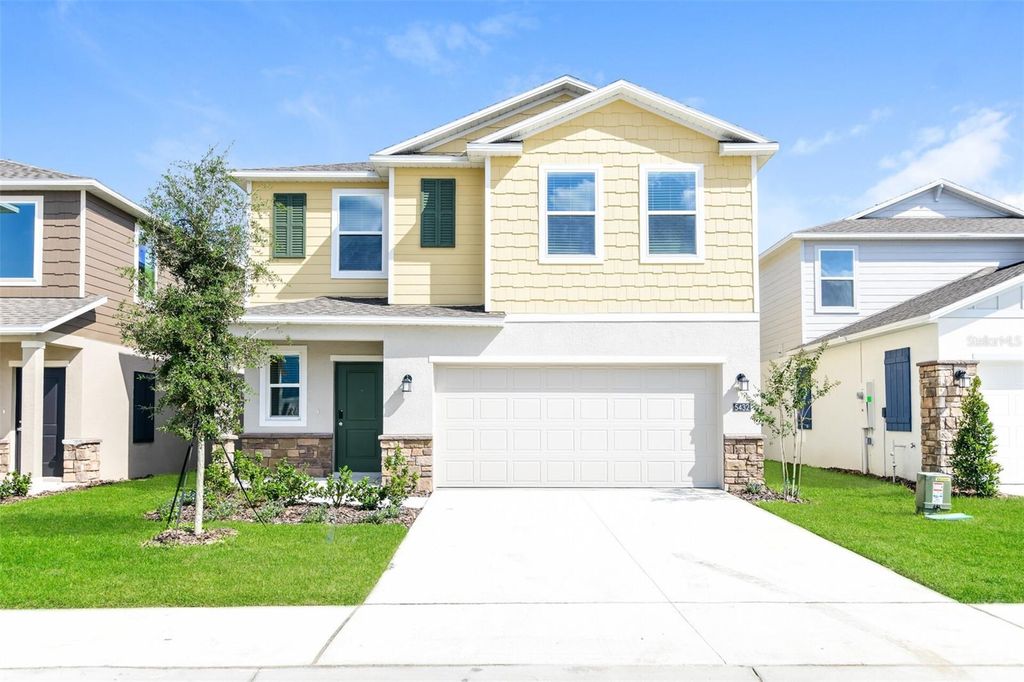 Photo of 5432 Meadow Walk Drive, Davenport, FL 33837 (MLS # O6370949)