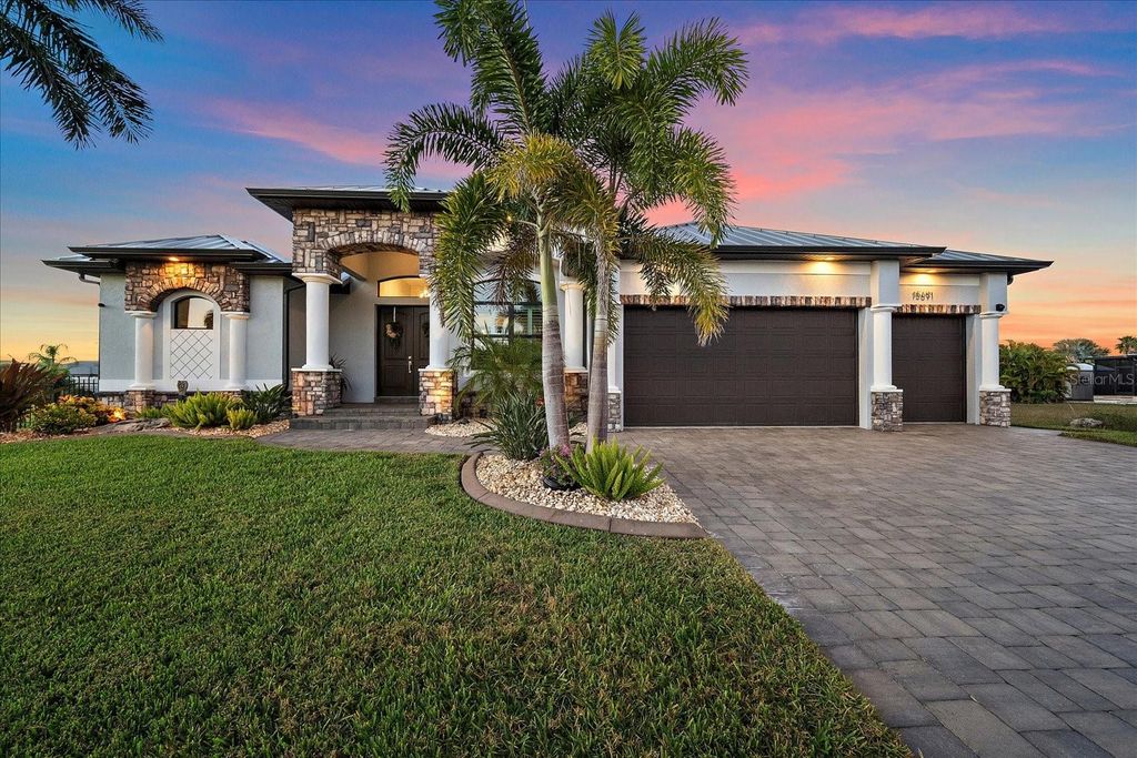 Photo of 15691 Meacham Circle, Port Charlotte, FL 33981 (MLS # A4673676)