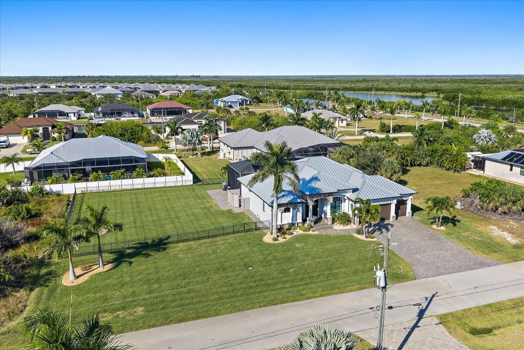 Photo of 15691 Meacham Circle, Port Charlotte, FL 33981 (MLS # A4673676)