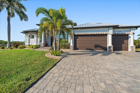 Photo of 15691 Meacham Circle, Port Charlotte, FL 33981 (MLS # A4673676)