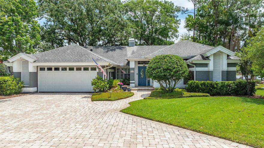 Beautiful, lakefront, move-in ready home on a quiet cul-de-sac in a very convenient location: 4.3 miles from UCF and 1.7 miles from SR 417.  Scenic Lake Mira can be viewed from the foyer and multiple rooms in the home, as well as the porch and exterior deck. Direct lake access is available from the floating dock. The shoreline protrudes into the lake making views from the home and dock more panoramic. Mature oaks and pines shade the backyard firepit, and fruit trees complement the landscape design. 
The spacious, bright, open floor plan with vaulted ceilings seamlessly connects the family room (with fireplace), kitchen, breakfast nook and dining room to lake views. All finishes have been updated in this lovely split bedroom plan, and the primary bathroom has been fully renovated. Garage updates include floor coating, wall storage systems, and attic storage. 
The roof is 8 years old, the HVAC is 5 years old, the home has been re-piped, and irrigation water comes from the lake. 
This immaculate home is a fantastic property worthy of your consideration.