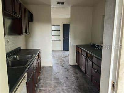 Photo of 1218 Dewey Avenue, Orlando, FL 32808 (MLS # O6432535)