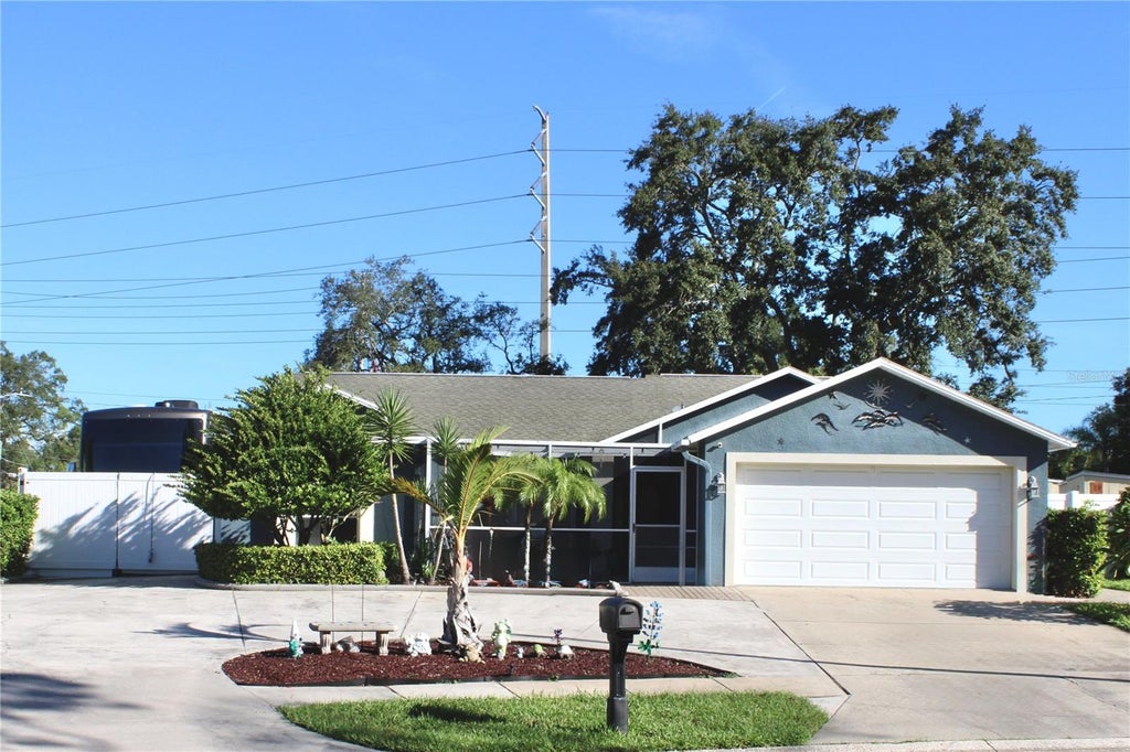 Photo of 1521 Foxcroft Drive W, Palm Harbor, FL 34683 (MLS # TB8546584)