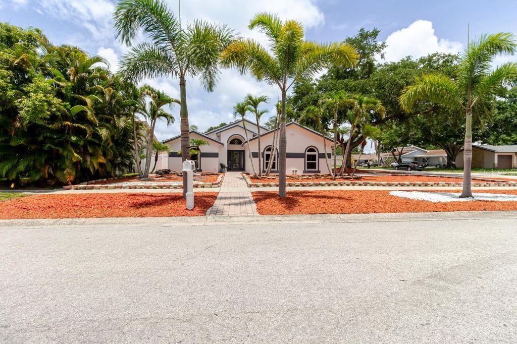 Photo of 8949 106th Avenue N, Seminole, FL 33777 (MLS # TB8513400)