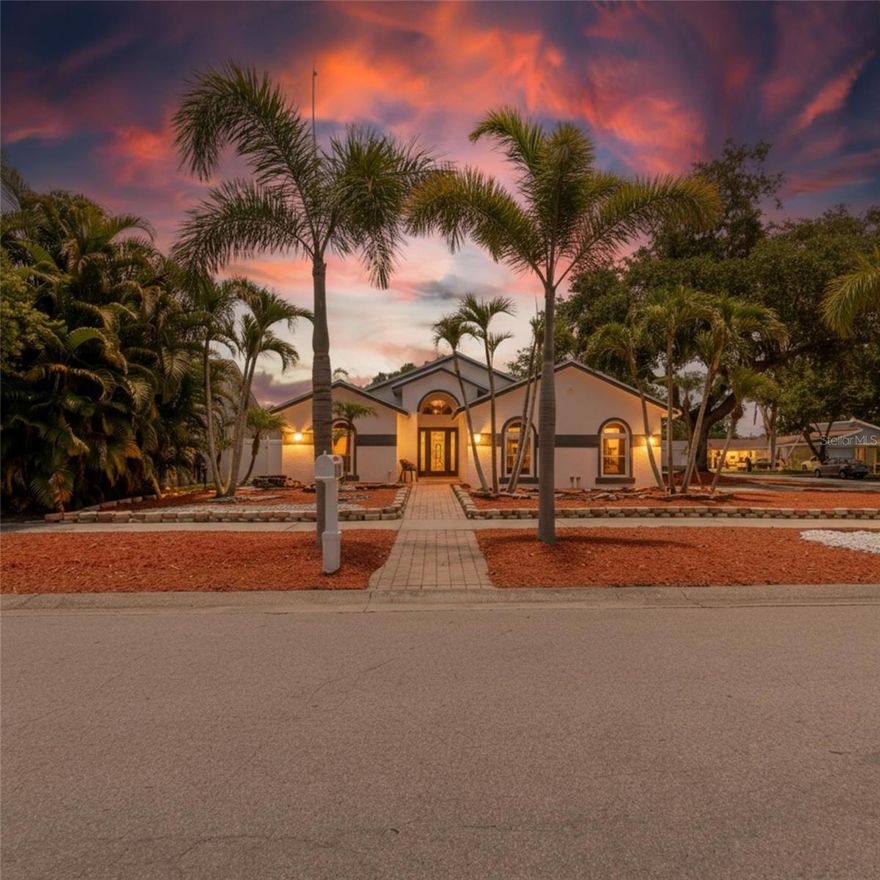 Welcome home to this beautifully updated 3 bedroom, 2 bathroom, 2 car garage home located in a desirable Seminole community just across from Bardmoor! Move-in ready with luxury vinyl flooring, updated kitchen and bathrooms, brand new appliances, newer windows, a new gas water heater and 2022 AC. Spacious layout features a separate dining room, breakfast nook, and a bright Florida room offering additional living space. Primary suite includes a walk-in closet, double sink vanity, corner soaking tub, and separate shower. Enjoy outdoor living with a covered patio perfect for grilling or space for relaxing around a fire pit. Large corner lot with low-maintenance zero-scaped yard, PVC vinyl fencing, storage shed, and plenty of garage storage. Conveniently located near shopping, dining, beaches, and more!