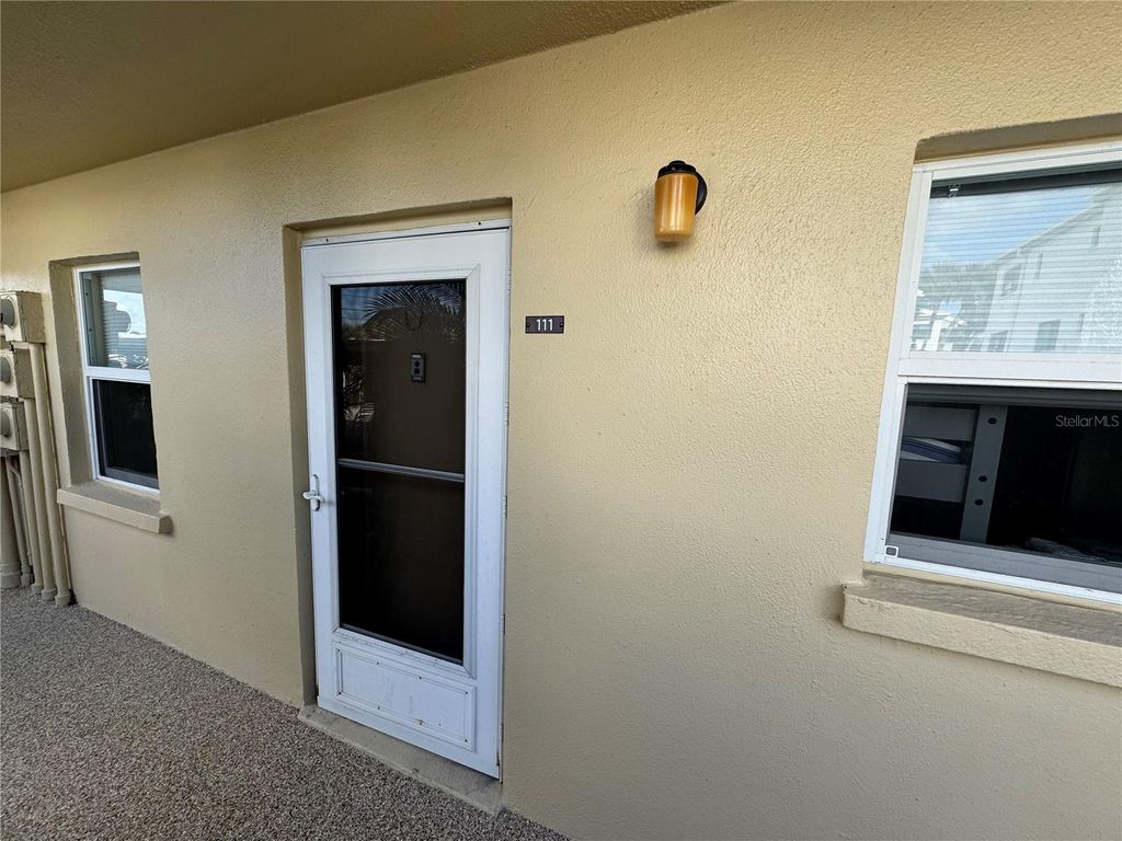 Photo of 1400 Tarpon Center Drive #111, Venice, FL 34285 (MLS # N6141989)