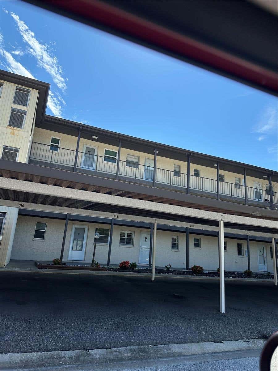 Photo of 5245 Amulet Drive #308, New Port Richey, FL 34652 (MLS # W7887359)