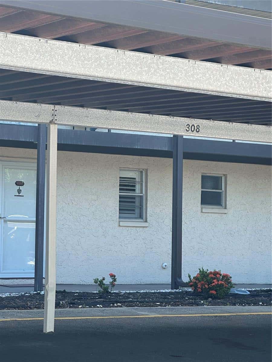Photo of 5245 Amulet Drive #308, New Port Richey, FL 34652 (MLS # W7887359)