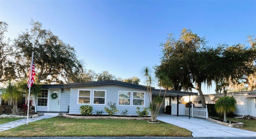 This well-maintained 2-bedroom, 2-bath home offers 1,236 square feet of comfortable, conditioned living space and a desirable open floor plan, enhanced by numerous updates completed over the past several years. The open, updated kitchen features a solar tube added in 2024, filling the space with natural light, along with newer appliances including a refrigerator and dishwasher (2025).
Major improvements include seven new windows (2024), a new A/C system (2023), and a new 40-gallon water heater installed in December 2025. The primary bathroom was completely renovated in 2024, while the second bathroom was freshly papered and painted in 2025. Interior walls and paint have all been updated within the past four years, and the exterior was painted in 2025. Flooring was properly permitted and completed by the previous owner for added peace of mind.
Outdoor enhancements include updated side and backyard landscaping (2024–2026), a golf cart path and patio (2026), and a driveway resurfacing currently in progress (2026). A dedicated laundry room added in 2026 adds convenience. The roof was installed in 2001. This home reflects pride of ownership with thoughtful updates inside and out.
Hawthorne at Leesburg is a vibrant 55+ community that blends comfort, convenience, and affordability. For just $397 a month, residents enjoy a maintenance-free lifestyle that includes water, sewer, lawn care, emergency services, and access to a wealth of resort-style amenities plus secure RV and boat storage. The expansive clubhouse is the social hub of the community, offering over 100 organized activities, a welcoming lounge, card rooms, billiards, a fitness center, a library, and a fine arts studio. A dedicated program coordinator ensures there’s always something fun and engaging on the calendar. For those who love the water, the private marina offers more than 120 boat slips with direct access to the beautiful Harris Chain of Lakes. Safety and peace of mind come standard, thanks to a 24/7 on-site team of state-certified firefighter/EMTs, emergency vehicles, and in-home emergency response buttons. Surrounded by natural beauty, the community features scenic walking trails, serene lake views, and plenty of opportunities for fishing and boating. The golf cart-friendly streets make it easy to explore nearby shopping, dining, and medical facilities. With a sparkling pool, endless recreational options, and a warm, welcoming atmosphere, Hawthorne at Leesburg isn’t just a place to live it’s a lifestyle. Schedule your showing today and discover the perfect blend of comfort, community, and convenience.