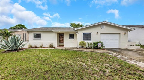 Photo of 952 Wicks Drive, Palm Harbor, FL 34684 (MLS # TB8542740)