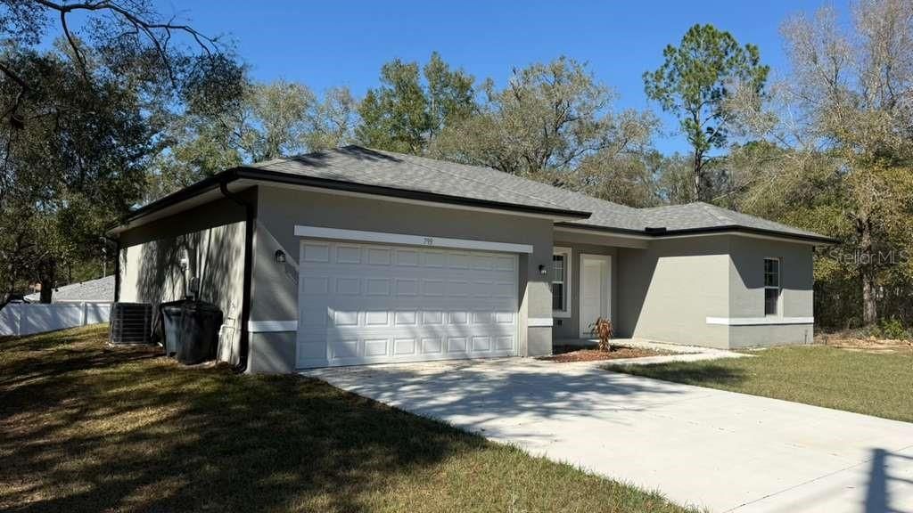 Photo of 799 W Country Club Boulevard, Citrus Springs, FL 34434 (MLS # O6389364)