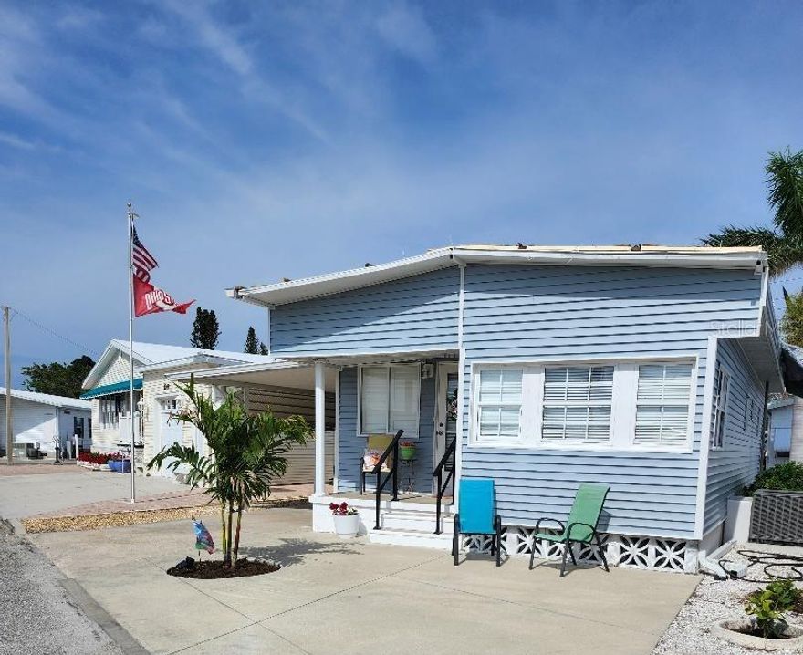 SUPER CUTE curb appeal, and beautifully updated Mobile Home in the highly desired, active 55+ Trailer Estates community. Open concept Living, Dining and Kitchen areas. Huge 10x22 Living room. Breakfast bar in kitchen. Two Bedrooms; one with ensuite full bath, one with ensuite half bath. New luxury vinyl floors throughout kitchen and dining room. Flex space could be Den/Office, or extra sleeping space. New roof, new vinyl siding. AC 2021, water heater 2017. WDO transferrable warranty. 10x16 laundry shed and workshop. You own the land. Boaters have direct access to Sarasota Bay from the Marina. Enjoy the large, heated community pool, hot tub, gym and wood shop. The community buzzes with pickleball, shuffleboard, kayaking, horseshoes, bocce, dancing and more. A US Post Office on site. 10 minutes to the SRQ Airport. Convenient to shopping, restaurants, the Arts and everything in Bradenton/Sarasota. Sold furnished. Priced to sell!