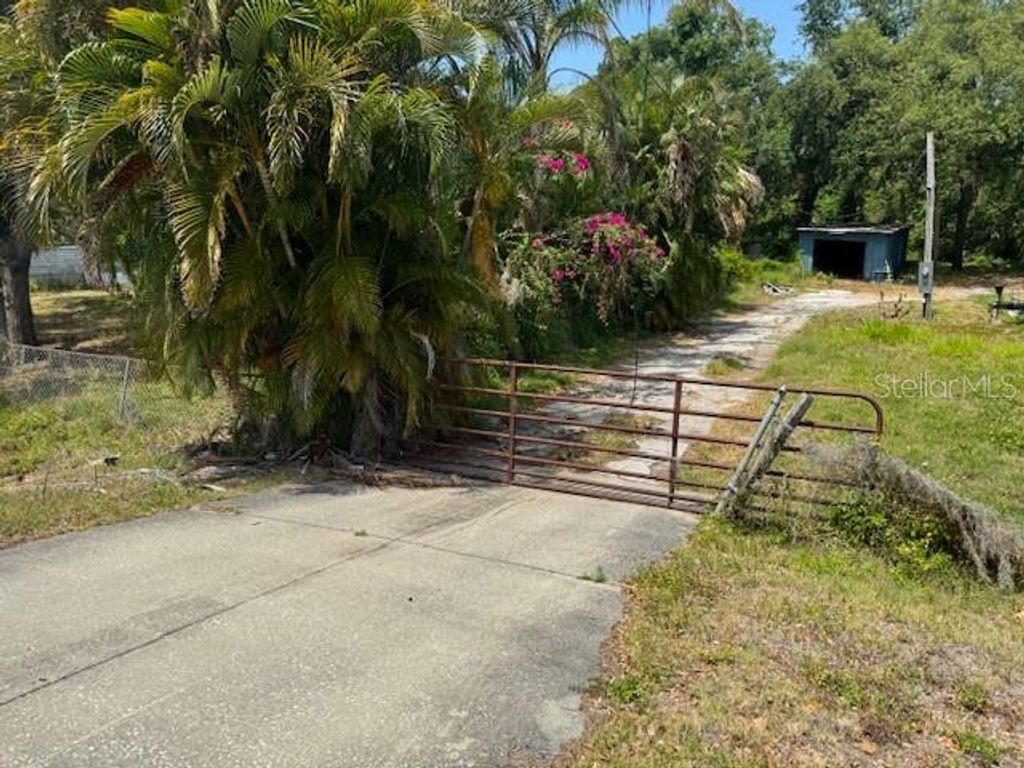 Photo of 10709 E Bay Road, Gibsonton, FL 33534 (MLS # TB8384557)