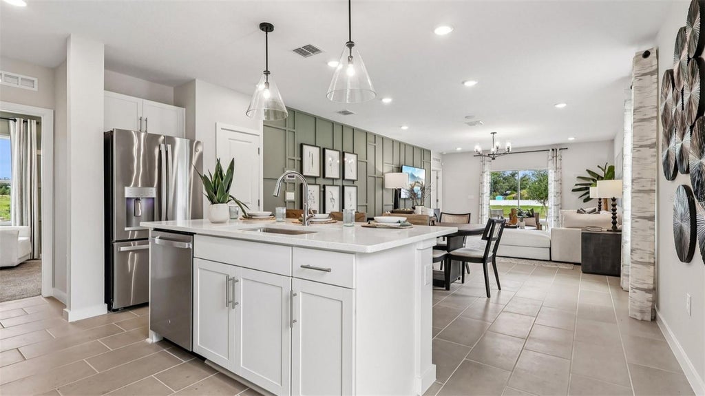 Photo of 428 Liberty Bend, Haines City, FL 33844 (MLS # O6434565)