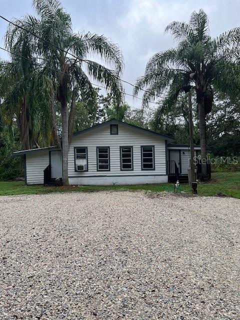 OWNER FINANCING with 35% down, 8% interest-only payments, 2 year balloon note. Public record says mobile/manufactured home but, to the eye, presents itself as a small single-family home. A long private drive leads you to the home which is located roughly halfway into the very deep 2+ acre homesite. If you value privacy, peace and quiet, and plenty of space to park your vehicles, this might be the place for you!