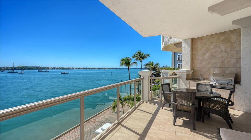 Freshly painted and professionally staged—with furnishings included—this move-in ready waterfront residence at La Bellasara presents an exceptional opportunity to enjoy refined bayfront living on coveted Golden Gate Point. Positioned on the third floor, Residence #304 offers expansive Sarasota Bay, marina, and downtown skyline views, paired with the scale and privacy of a single-family home within a boutique, gated enclave.
Spanning approximately 3,290 square feet of interior living space, plus multiple generous terraces, the open layout is designed for both everyday comfort and entertaining. A private elevator opens directly into the residence, leading to a gracious foyer and an impressive Grand Salon. This spacious living and dining area is framed by floor-to-ceiling glass and 11-foot tray ceilings, with marble flooring, crown molding, a gas fireplace, and a wet bar with wine refrigeration. Expansive sliding glass doors open to the main waterfront terrace, creating a seamless indoor-outdoor connection and showcasing panoramic bay and marina views.
The kitchen blends function and style, featuring solid wood cabinetry, stone countertops, a center island with breakfast bar seating, pantry storage, and premium appliances including a gas cooktop, built-in ovens, and wine refrigeration. The adjacent dining area is ideally positioned to capture water views, enhancing both casual meals and formal gatherings.
The primary suite offers a private retreat with its own bayfront terrace, dual walk-in closets, and marble his-and-her bathrooms. Two additional guest suites are arranged for privacy, each with en-suite baths, walk-in closets, and private balconies. A study/library with closet provides flexibility for a home office, media room, or fourth bedroom.
Desirable conveniences to complement this perfectly placed residence include a private two-car garage, secure storage, and a deeded dock with the ability to add a lift—an exceptional benefit for boating enthusiasts.
La Bellasara is a gated, boutique waterfront community offering on-site management, a fitness center, resort-style pool and spa, and a private marina setting. Located on Golden Gate Point, residents enjoy a quiet residential atmosphere just moments from downtown Sarasota. Marina Jack, Selby Gardens, Burns Court, The Bay Park, and the city’s renowned theaters, galleries, and waterfront dining are all within easy reach. St. Armands Circle and Lido Beach are just minutes away, completing a lifestyle defined by walkability, boating access, and proximity to Sarasota’s Cultural Coast.
Residence #304 delivers a rare combination of updated presentation, included furnishings, generous square footage, and direct bayfront living in one of Sarasota’s most desirable waterfront communities.