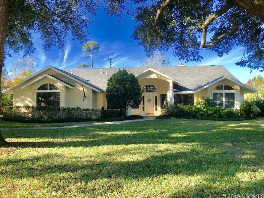 Spacious Sugar Mill home renovated throughout in 2015, featuring wood flooring & fabulous floor-to-ceiling fireplace in great room.  Stainless appliances, 42â cabinets, extensive granite counters & bar in bright kitchen.  Formal dining room.   Separate private office with glass doors.   Master suite with quartz counters, walk in shower, separate tub & huge closet.  Garage with 3rd bay for golf cart, small car or other toys.   Enjoy the private backyard with gazebo, covered porch & deck.  Plenty of room for pool.   This floorplan works well for growing family or in-laws.  Ideal golf club location.  Roof new 2015.  See to appreciate.  Refrigerator in garage excluded. ;Water: City