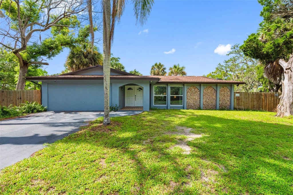 Photo of 7032 Morningstar Lane, New Port Richey, FL 34652 (MLS # TB8531940)