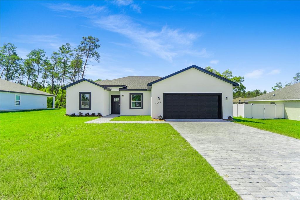 Photo of 3908 SW 171st Lane, Ocala, FL 34473 (MLS # O6400360)