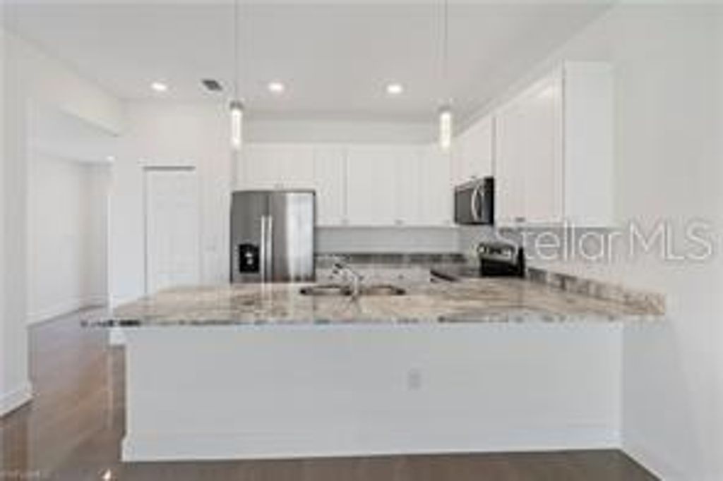 Photo of 326 Limerick Avenue S, Lehigh Acres, FL 33974 (MLS # TB8452404)