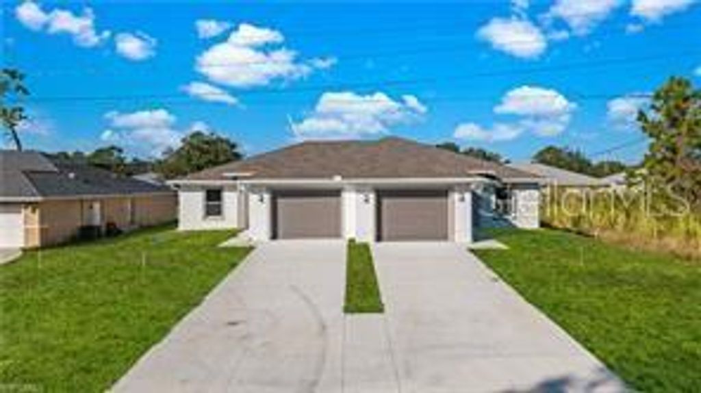 Photo of 326 Limerick Avenue S, Lehigh Acres, FL 33974 (MLS # TB8452404)