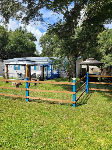 Photo of 12950 SE 104th Court, Belleview, FL 34420 (MLS # TB8428522)