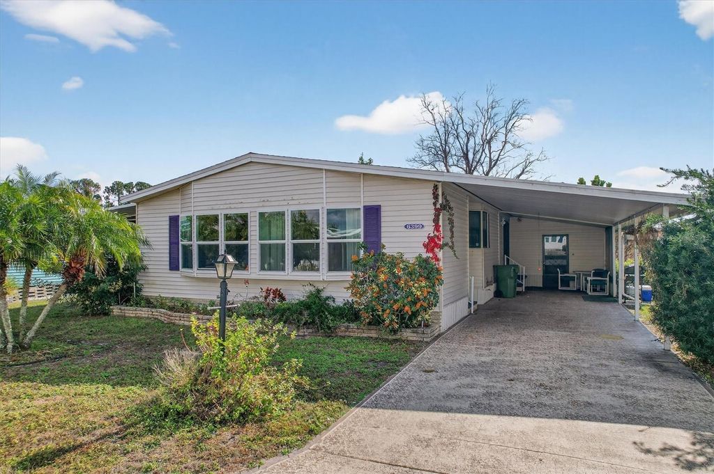 Photo of 6399 Lolly Bay Loop NE, Winter Haven, FL 33881 (MLS # O6372285)