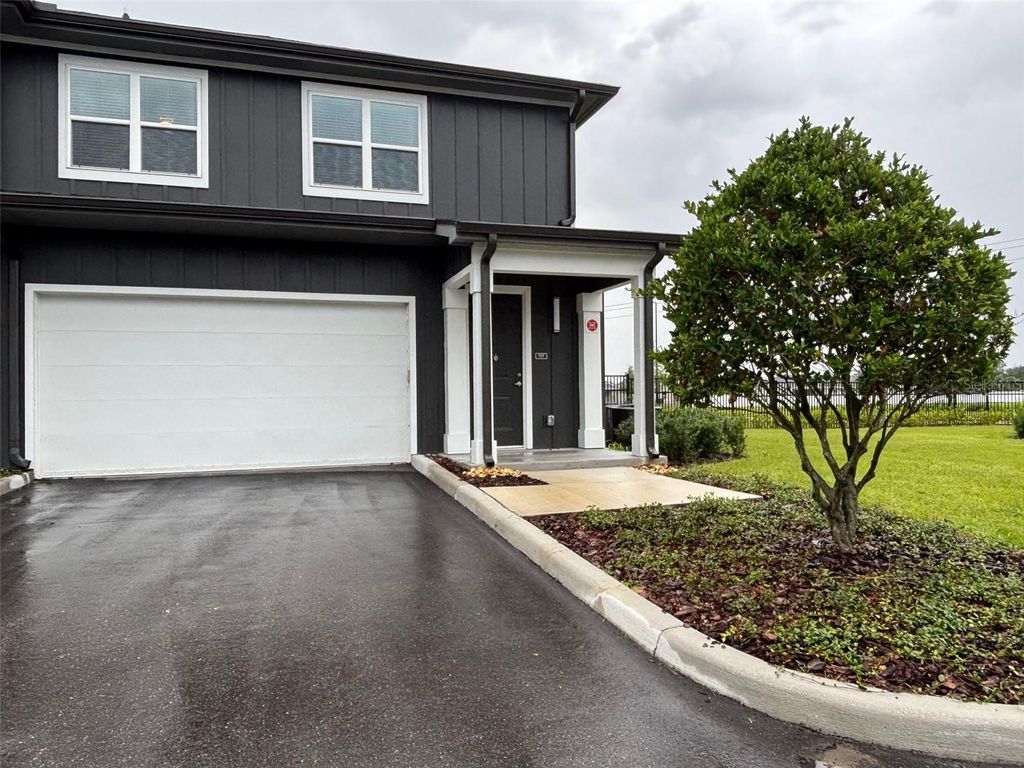 Photo of 1320 Caprice Drive #TH, Lakeland, FL 33811 (MLS # O6311116)