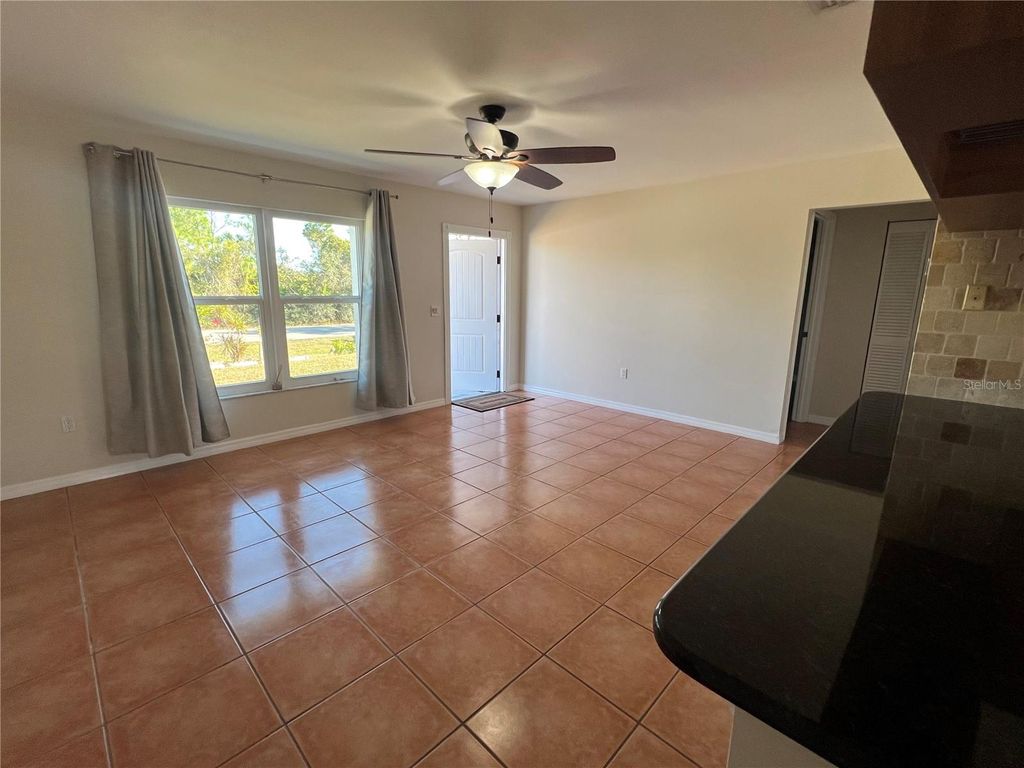 Photo of 456 Millport Street NW, Port Charlotte, FL 33948 (MLS # C7519569)