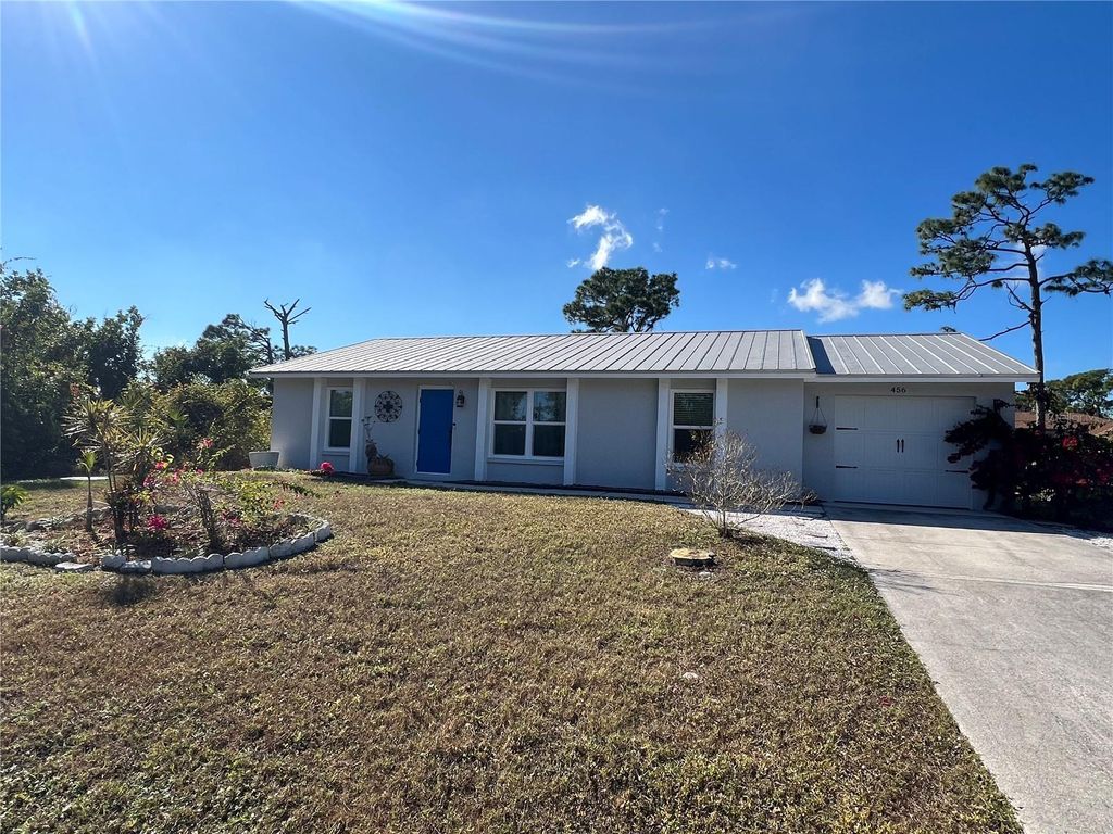 Photo of 456 Millport Street NW, Port Charlotte, FL 33948 (MLS # C7519569)