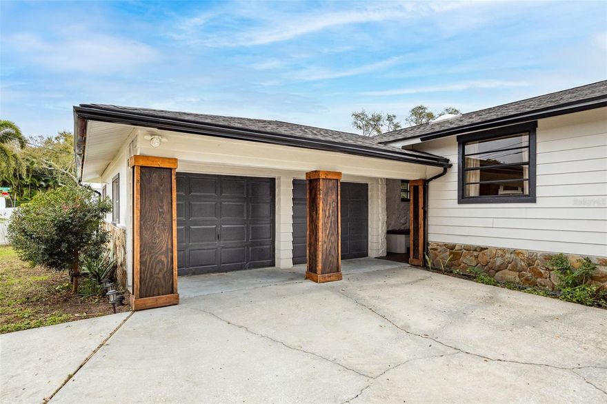 Welcome to this beautifully updated 3-bedroom, 2.5-bath, 2-car garage home nestled in a quiet, private, and well-established Seminole neighborhood—a true hidden gem sitting at a 10 ft elevation. This residence offers an inviting open floor plan highlighted by an updated kitchen with butcher block countertops and black stainless steel appliances, complemented by wood-inspired tile flooring throughout the main living areas, including the front entry and garage stairway. Thoughtful upgrades abound, including a newly renovated guest bathroom, custom entertainment center, new roof, updated insulation and vapor barrier in the crawl space, interior and exterior paint, luxury vinyl plank flooring in the primary bedroom and 1 other bedroom, new composite deck, trees have been removed, new front door, new drywall and insulation in the garage, all new closet doors, and a water softener system and much more. The AC system and gutters were replaced in 2020, offering added peace of mind. Enjoy cozy evenings by the wood-burning fireplace during cooler months or relax on the screened outdoor lanai. The oversized two-car garage features built-in storage and ample space for a boat or recreational toys—ideal for taking advantage of the public boat launch with direct Gulf access being only 2 miles away. All bedrooms are conveniently located on one side of the home, providing privacy and a functional separation from the main living areas. Ideally situated just minutes from the pristine beaches of Redington Shores and Indian Shores, and under 2 miles from Seminole City Center, offering easy access to shopping, dining, and everyday conveniences. Make us a reasonable offer.