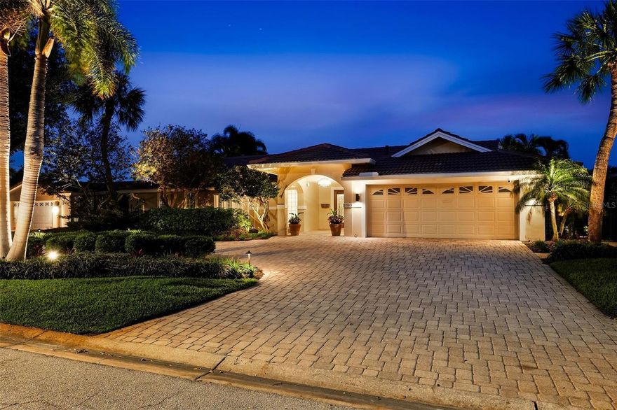 Welcome to 2080 Hawaii Avenue NE, a beautifully updated waterfront residence in the highly sought-after Venetian Isles community. Situated on over a quarter-acre lot (.28), and offering just under 3,200 square feet of indoor living space, this spacious home features 4 bedrooms, 4 full bathrooms, and a dedicated home office with built-ins.
Designed for both comfortable living and effortless entertaining, the home boasts a large family room anchored by a gas fireplace, and an oversized dining room ideal for hosting gatherings- complete with additional built-in storage cabinets and overflow counter space. Both rooms are surrounded by glass French doors with views of the pool and water for seamless indoor/outdoor living.
Step outside to a truly impressive outdoor living space, complete with incredible views of Tampa Bay and downtown Tampa. The massive backyard showcases a heated saltwater pool and spa, travertine paver patio, covered entertaining area, built-in gas fire pit, storage locker for miscellaneous patio items, fishing rod locker, and a fully equipped outdoor kitchen featuring bar seating, grill, storage, beverage refrigerator, ice maker, and a pergola for year-round enjoyment. Boating enthusiasts will appreciate the private dock with electric and water, along with a 10,000-pound boat lift providing quick access to open, unobstructed access to Tampa Bay.
The expansive indoor laundry room doubles as a butler’s pantry, complete with a catering-size refrigerator, ice maker, wine refrigerator, and beverage fridge. Additional highlights include tile flooring throughout, a barrel tile roof (2004), new HVAC system (2026), water heater (2019), updated electrical system (2026), new pool equipment (2026), and a seawall completed in 2010.
Venetian Isles is known for its friendly, welcoming community and unbeatable location. Just 4 miles from downtown St. Pete, you’re only minutes away by boat, bike, or golf cart from world-class dining, museums, parks, and nightlife. Add in quick access to Tampa International Airport and the award-winning Gulf beaches, and you’ll see why this is the waterfront lifestyle so many dream of.