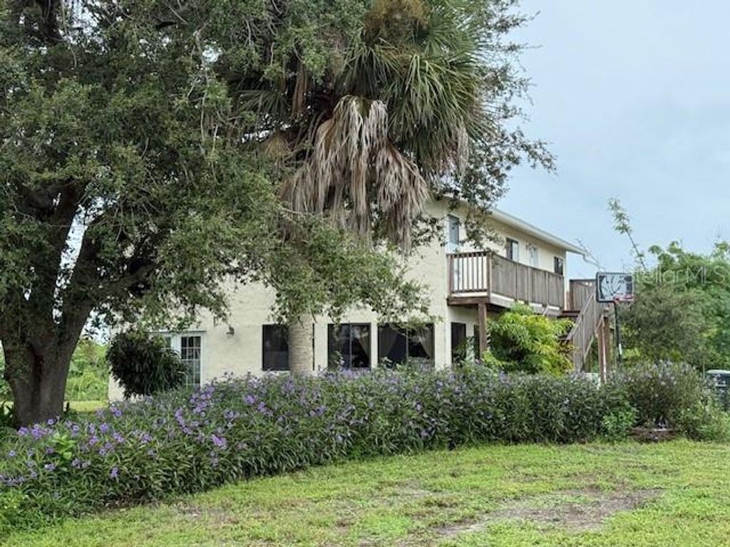Photo of 1799 E Manasota Beach Road, Englewood, FL 34223 (MLS # A4663125)