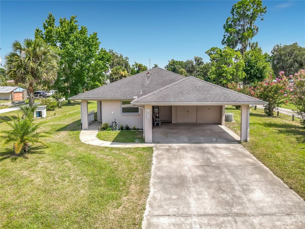 Photo of 30620 NE 95th Place, Fort Mccoy, FL 32134 (MLS # TB8530317)