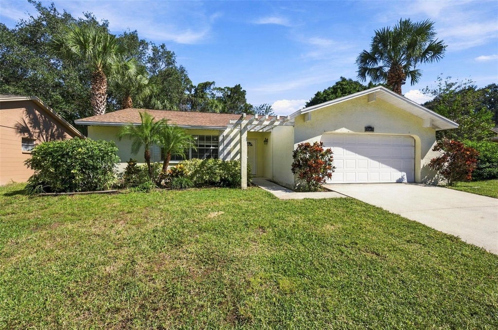 Photo of 2383 Grove Valley Avenue, Palm Harbor, FL 34683 (MLS # W7890611)