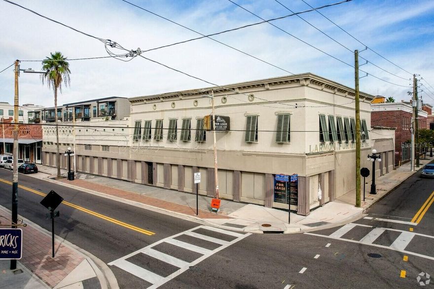 Situated in the heart of Ybor City on historic 7th Avenue, this iconic mixed-use property presents a rare opportunity for investors or owner-users seeking a prime location in one of Tampa’s most vibrant districts.
The property features approximately 17,864 square feet of flexible space ideal for office, retail, or restaurant use, with the ability to subdivide. This historic building offers strong visibility, high foot traffic, and immediate access to surrounding retail, dining, and entertainment venues.
Additional highlights include ample onsite parking, central air conditioning, and flexible build-out potential. Positioned along a main thoroughfare, this property benefits from consistent pedestrian and vehicle traffic, making it ideal for a wide range of commercial uses.