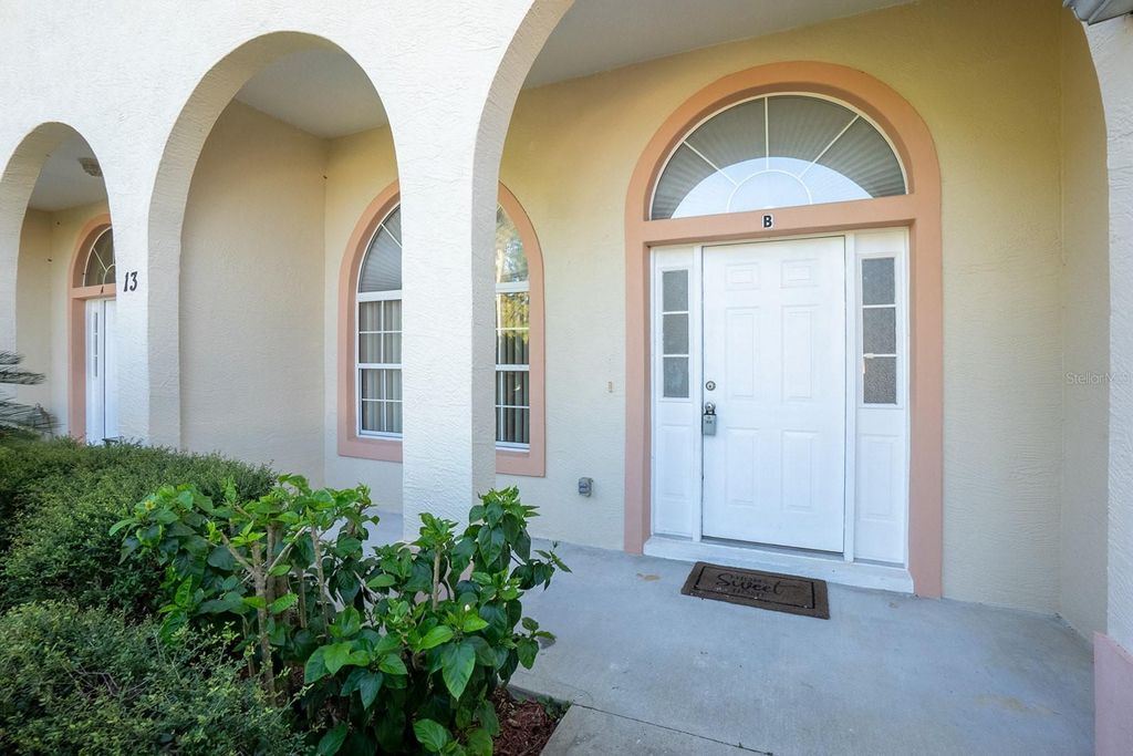 Photo of 13 Buttonwood Lane #A, Palm Coast, FL 32137 (MLS # FC313417)