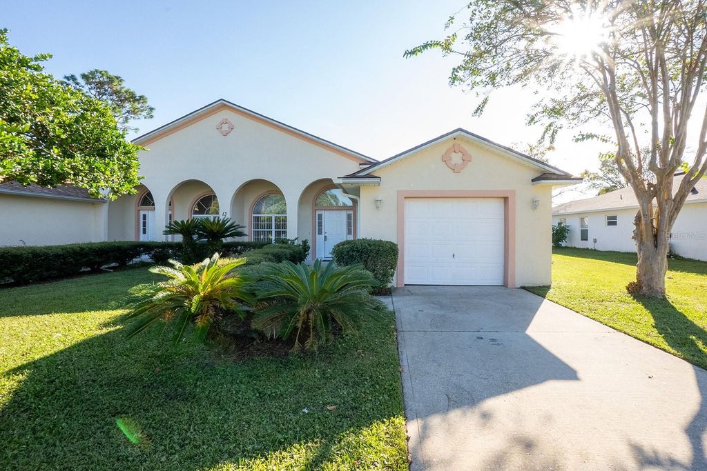 Photo of 13 Buttonwood Lane #A, Palm Coast, FL 32137 (MLS # FC313417)