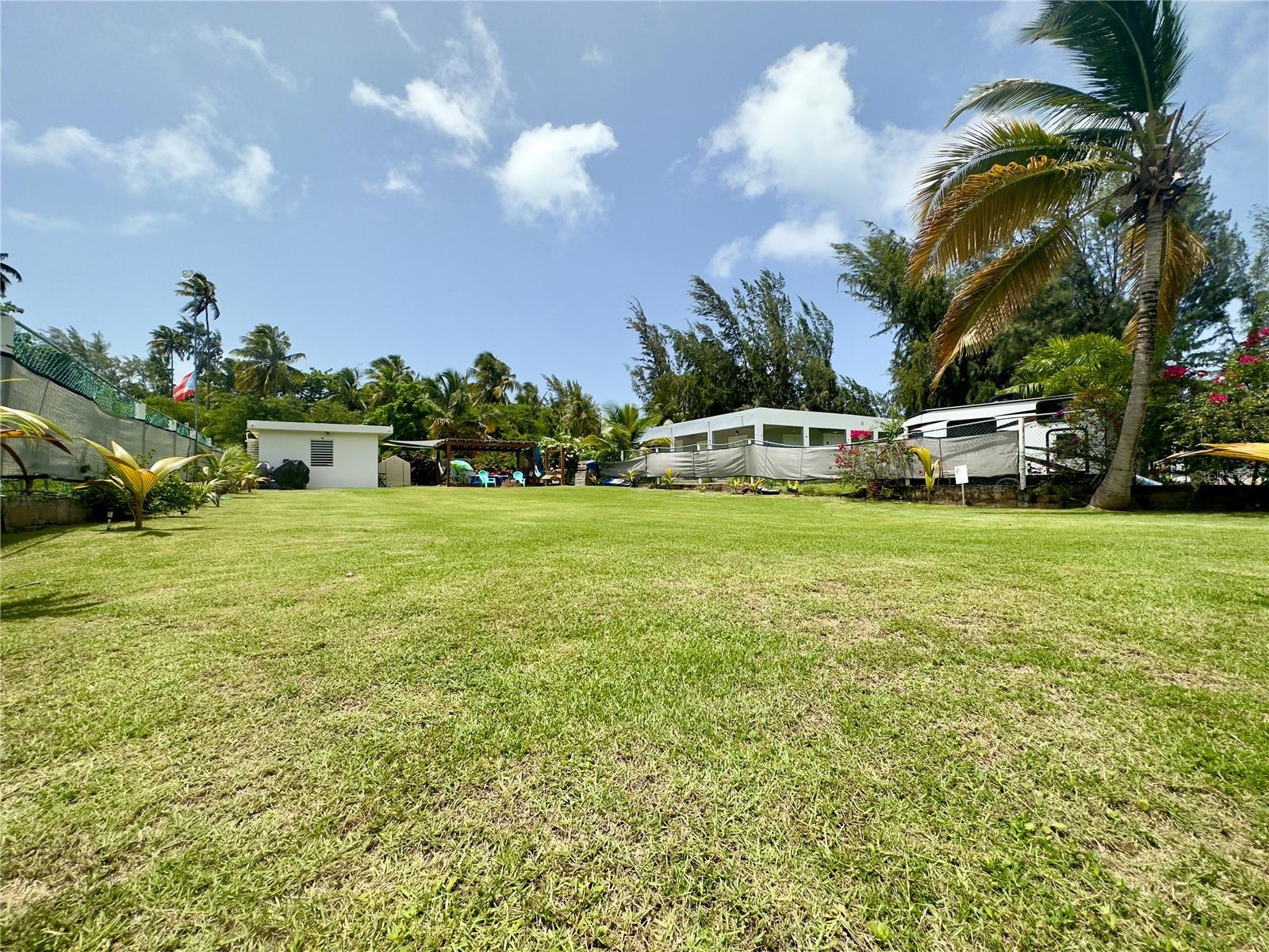 Discover the best of coastal living in Las Picuas Rio Grande, walking distance to the beach. Las Picuas is beautiful peninsula of mangrove preserve extending into the Atlantic Ocean with seclusive beaches, located at the foothills of El Yunque National rainforest. Currently set up as a cozy single family home for residential and short rental uses it consists of approximately 400 sq.ft. of living area with 1 bedroom, dining and living room, a recently renovated kitchen and bathroom and laundry/storage area. Electric and water services are already connected. This is a unique opportunity to own a little piece of paradise by the beach, build your dream home and/or establish your short term rental business, guesthouse, or mini boutique hotel. Lot size is approximately 800 sq.m. Located close by Puerto Rico's best beach and golf resorts, tourists attractions, and only 45 minutes drive to San Juan. Fractional ownership with segregation in process. Zoning: DTS (Selective Tourist Development). Tourism tax incentives may apply. Owner financing may be considered. Please call for a private appointment!
