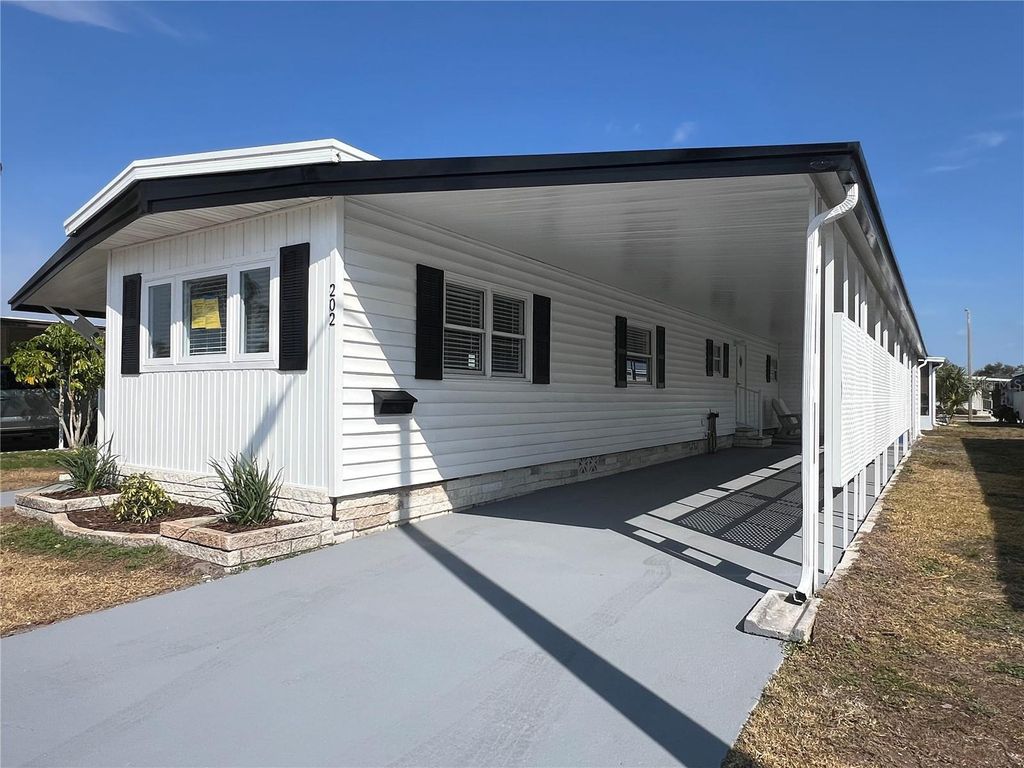 Photo of 1100 Belcher Road S #202, Largo, FL 33771 (MLS # TB8476696)