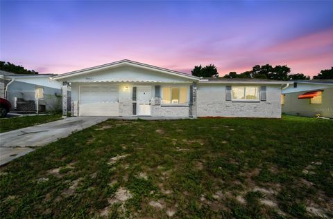Photo of 10831 Manchester Road, Port Richey, FL 34668 (MLS # TB8401007)