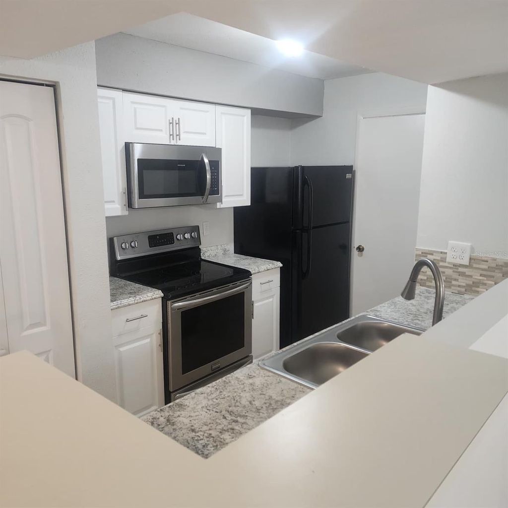 Photo of 3004 Parkway Boulevard #104, Kissimmee, FL 34747 (MLS # O6405396)