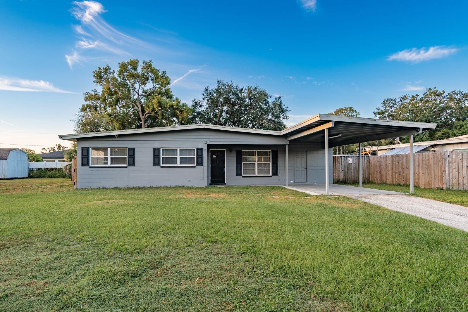 Opportunity awaits in this up-and-coming area of the Riverbend neighborhood! This 3 bedroom, 1 bathroom bungalow is loaded with potential. Situated high and dry on a large lot with a fenced yard, this home offers room to expand upon the existing 910 square feet if you wish and also offers room for a pool. There is a large screened patio and a spacious utility room accessible from the patio and carport. 
Inside you'll find 3 bedrooms and a bathroom with a living and dining area connected to the kitchen. Bring your imagination and transform this bungalow into your dream home or your next investment project. 
This home is located minutes from the Hillsborough River, Downtown Tampa, I-275, Tampa International Airport, and attractions like Busch Gardens, Zoo Tampa, and Raymond James Stadium, as well as some of the city's best local dining. There's no HOA or CDD and you are surrounded by ongoing renovations and appreciating homes.