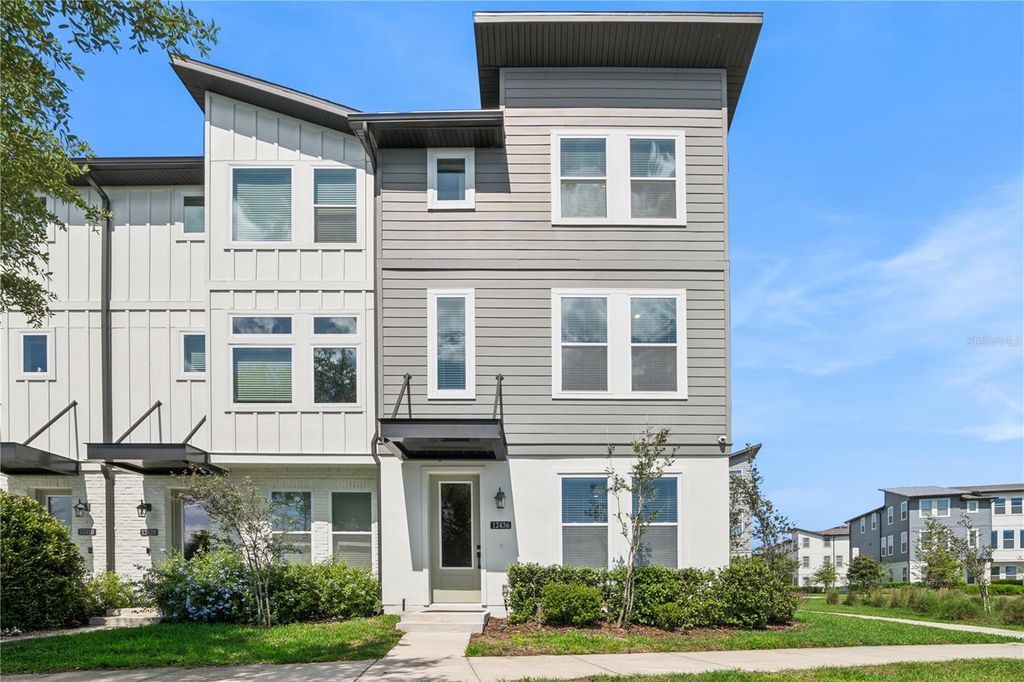 Photo of 12436 Koshiba Alley, Orlando, FL 32827 (MLS # O6400058)